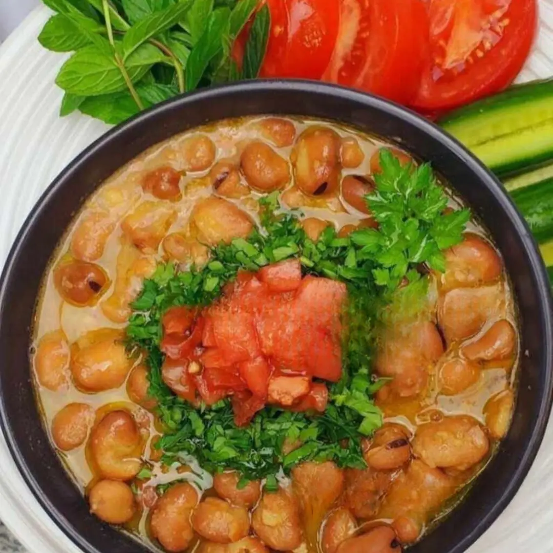 صحن فول بالطماطم والطشة